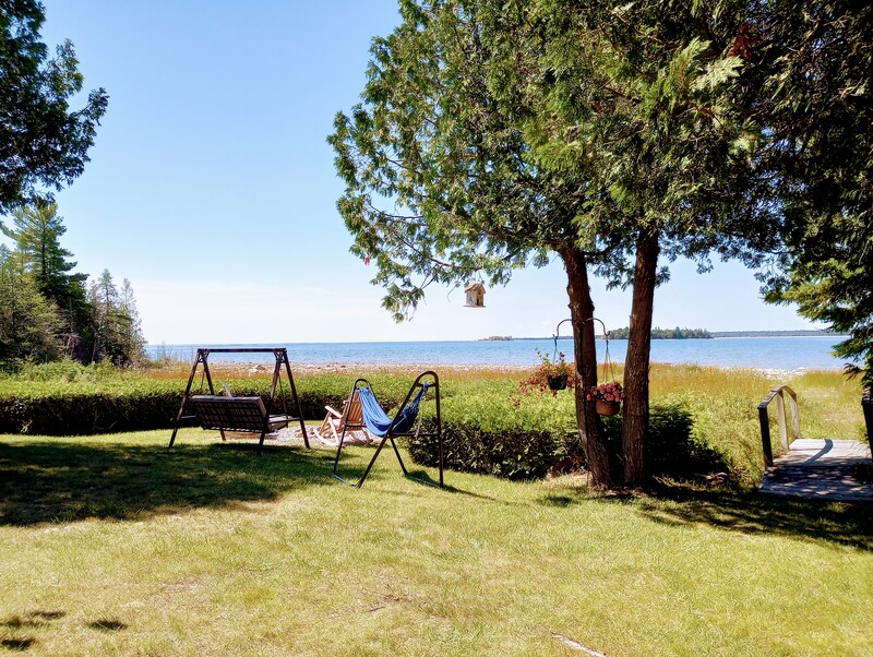 Lovely Lake Huron frontage with so many sitting and viewing options for you.