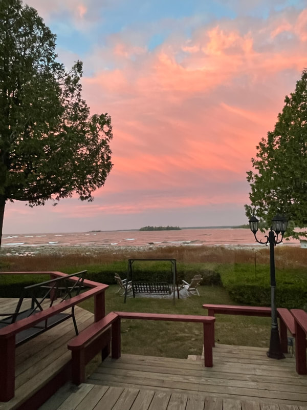 Rosy evening skies at Candlelite Cove delight.